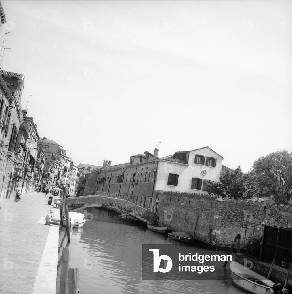 View of a canal in Venice (b/w photo)