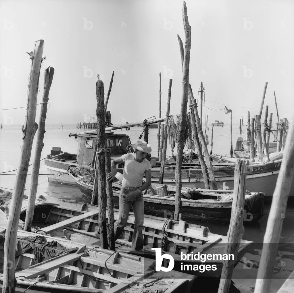 Berthing of boats in Venice (b/w photo)