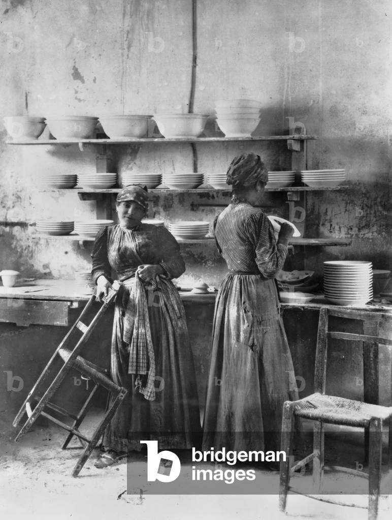 Workers refining plates in the Ginori Factory, in Doccia near Florence