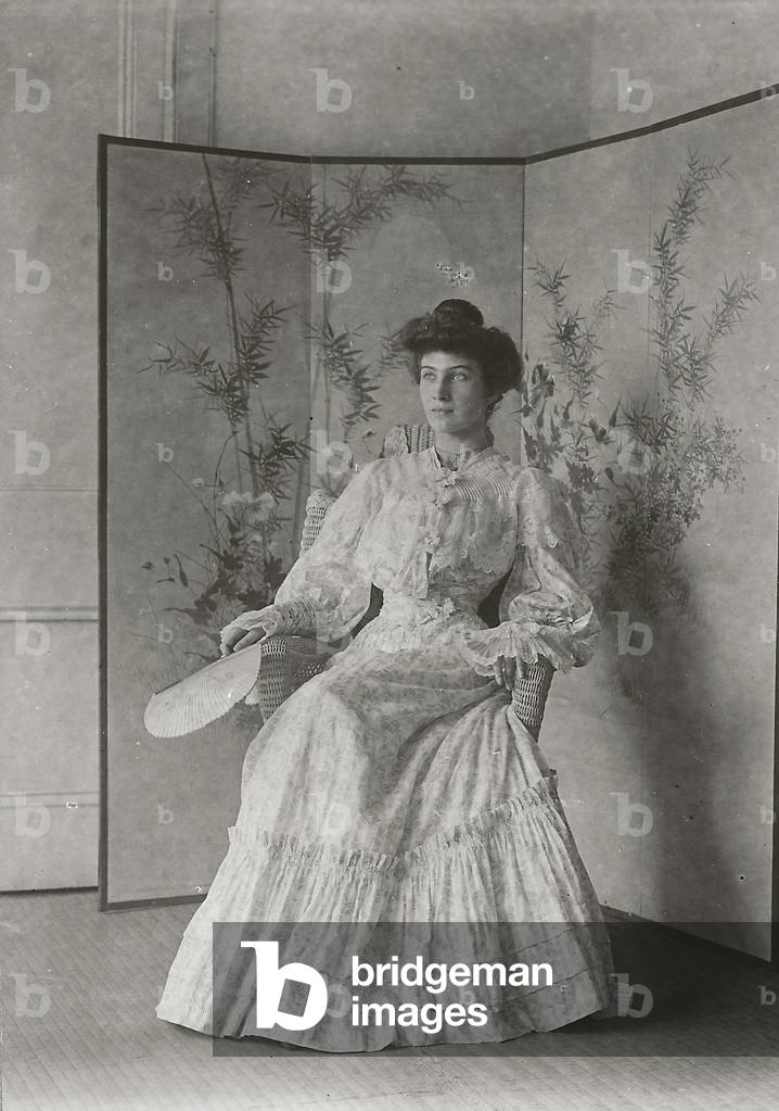Portrait of a young woman in period dress