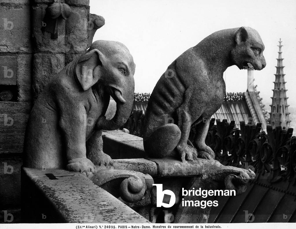 Two figures depicting an elephant and a panther, Detail of the sculptures located on a terrace in the Cathedral of Notre-Dame, Paris