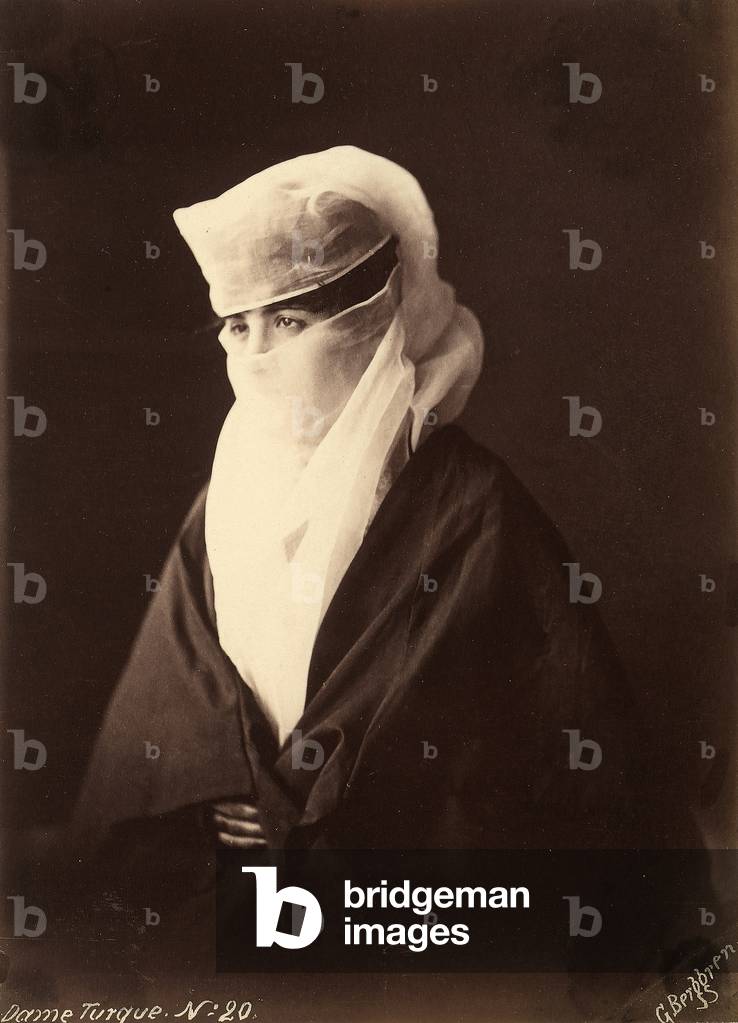 Turkish woman with her face covered by a chador