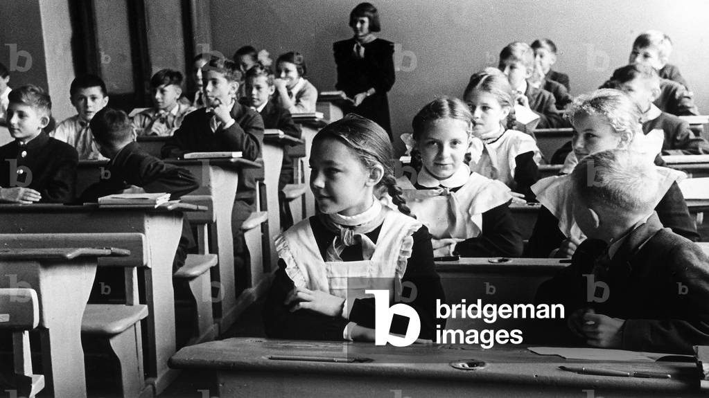 Children sitting at their desks, at a school in Moscow, Russia