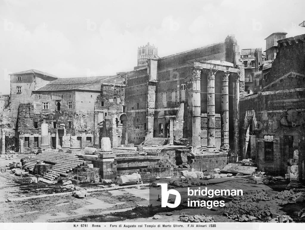 The three still integral columns on the right side of the temple of Mars the Avenger, in the Augustus forum in Rome