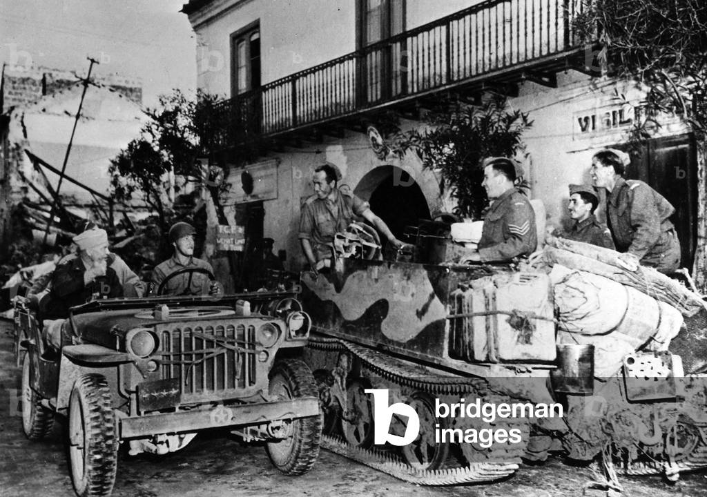 General Eisenhower joking with some soldiers on the Italian Front (b/w photo)