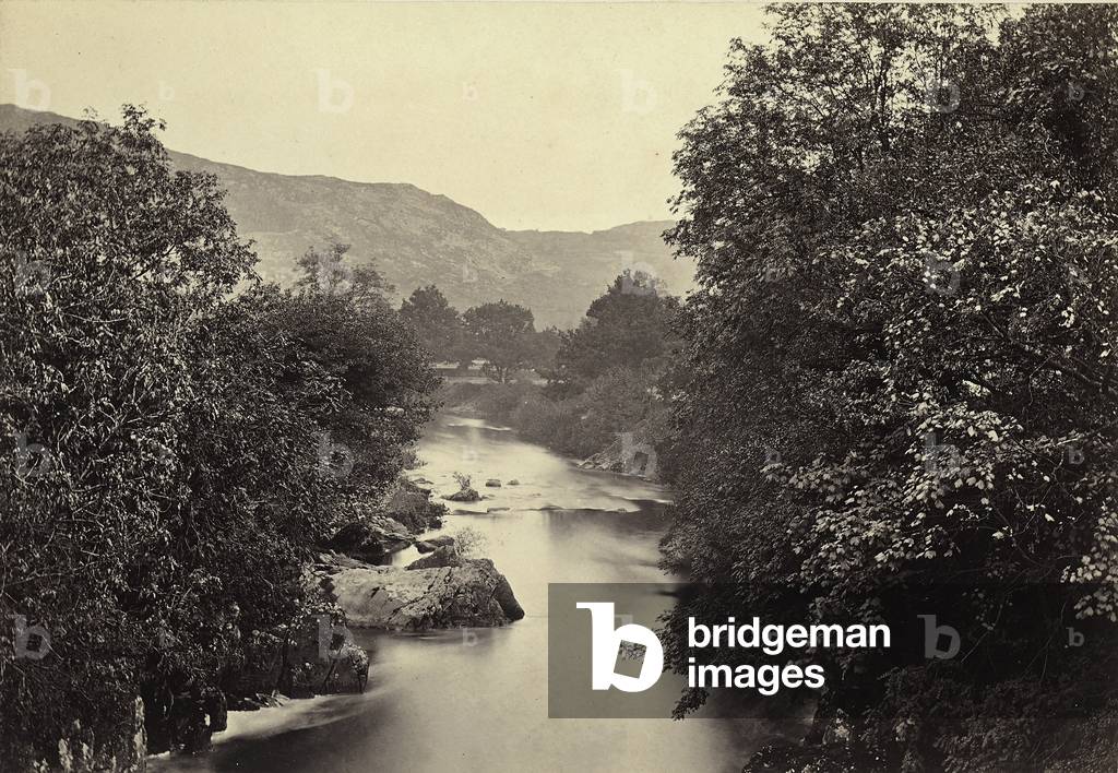The Betws-y-coed river, center of the Welsh holiday village, England