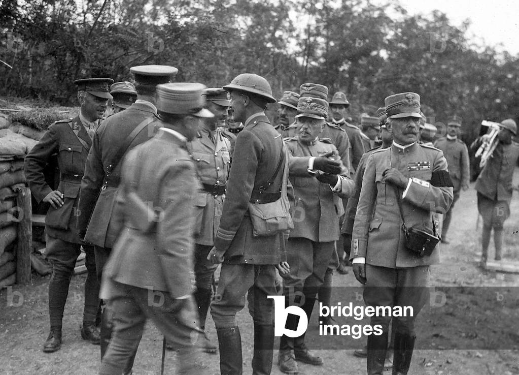General Cadorna and General Porro visit English batteries during World War I (b/w photo)