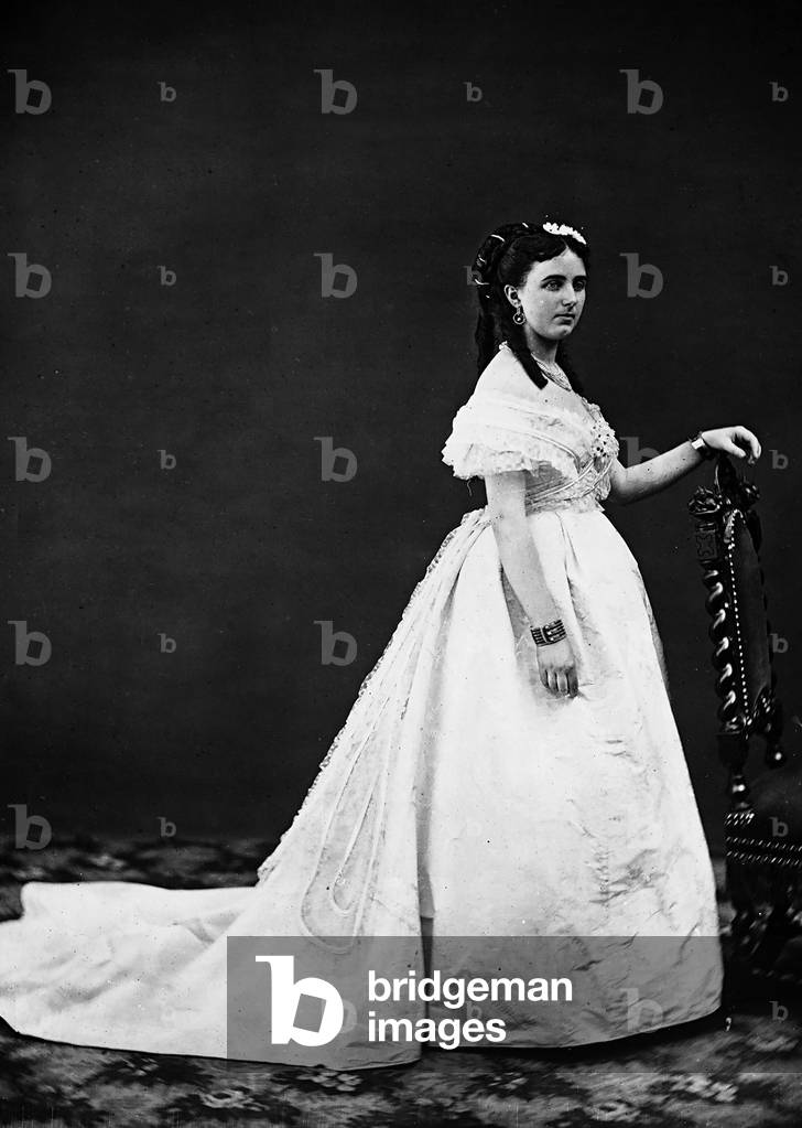 Portrait of woman in elegant white dress