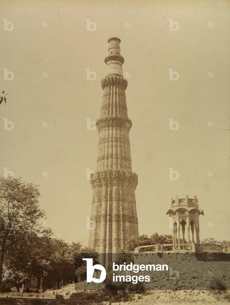 The Qutb Minar, a stone minaret that was started by King Qutb-ud-din Aibak; the first Indian mosque of Delhi was built at its base