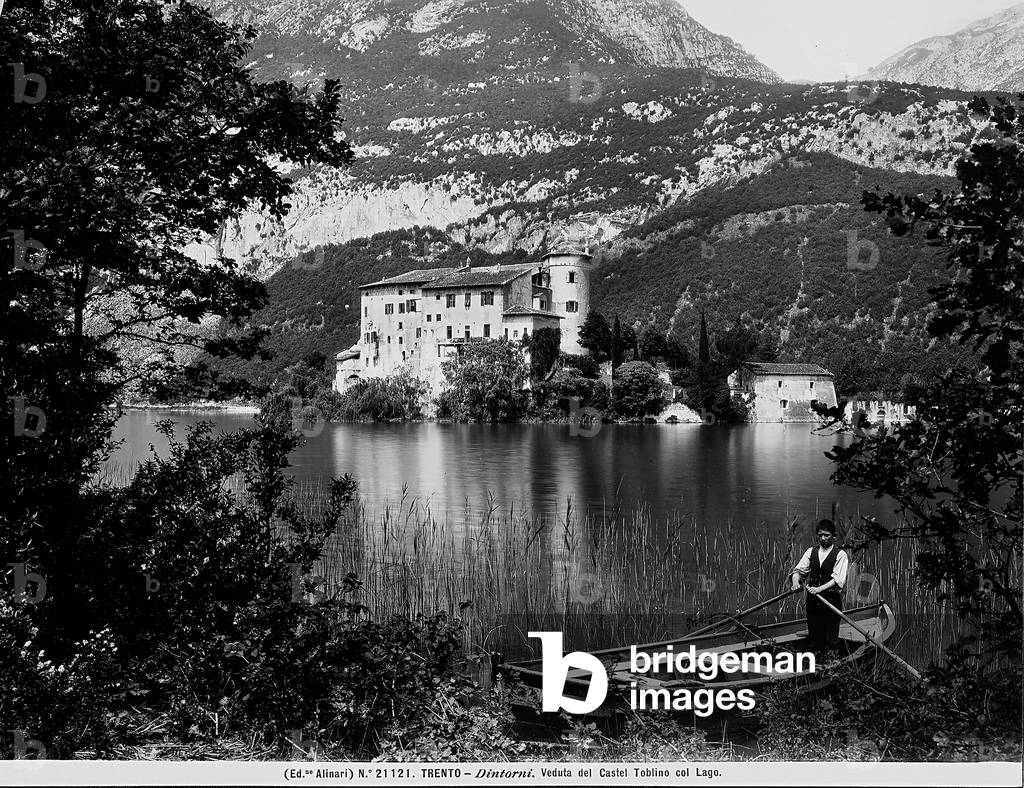 View with people of Toblino Castle on the lake