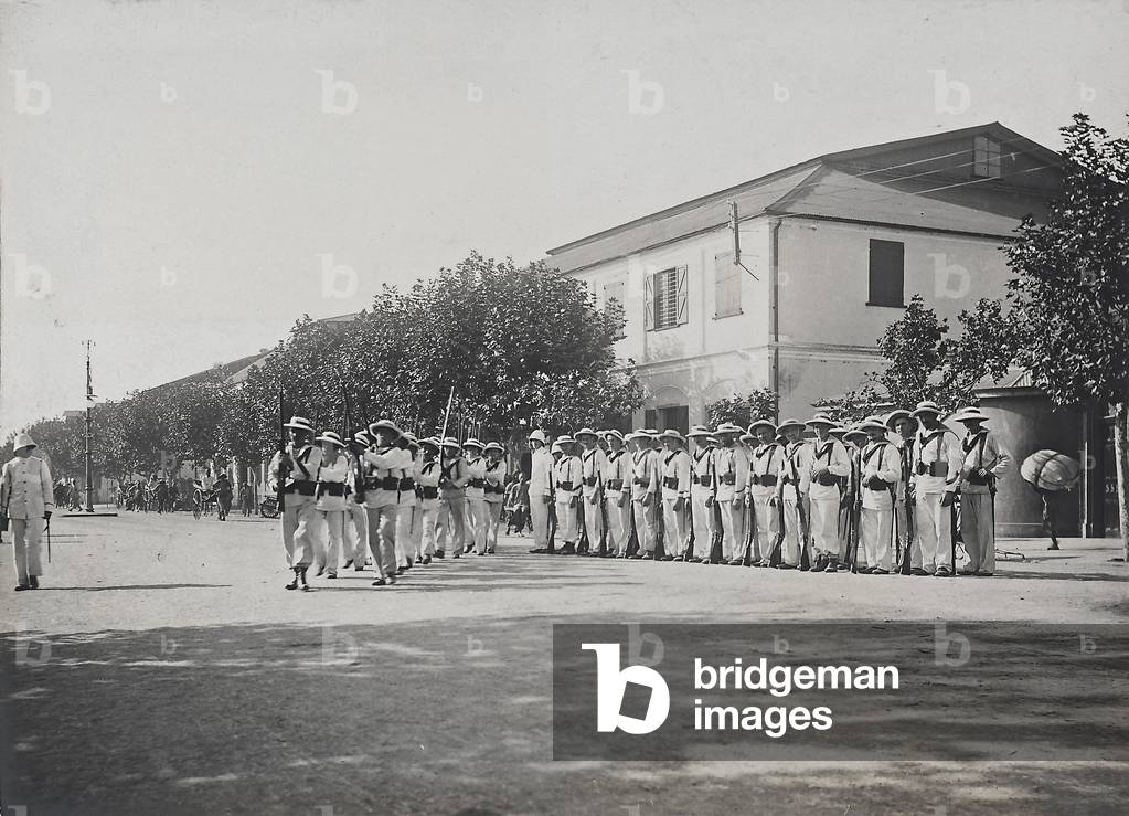 Some members of the British Colonial Armed Forces in a town in China, during an official demonstration