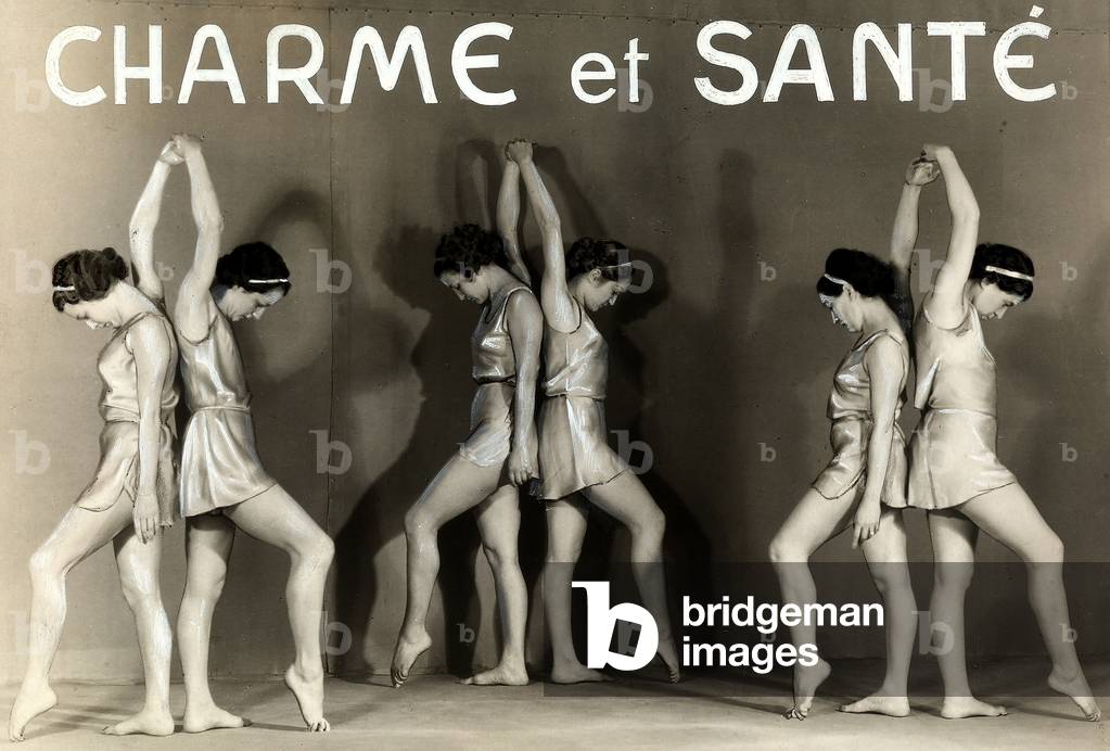 Pairs of dancers in a choreographic pose.