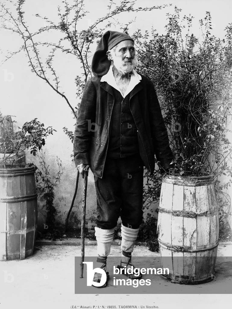 Portrait of an elderly man in traditional Sicilian dress; Taormina, Messina