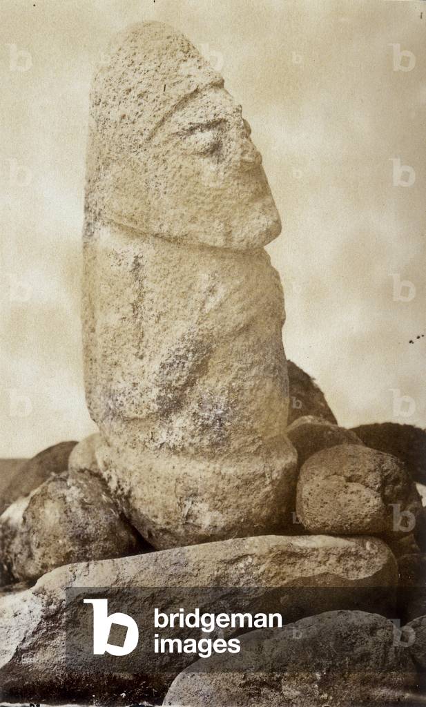 A souvenir of Odoardo Beccari's journeys: male figure carved in stone before Indian rule in Java, Indonesia