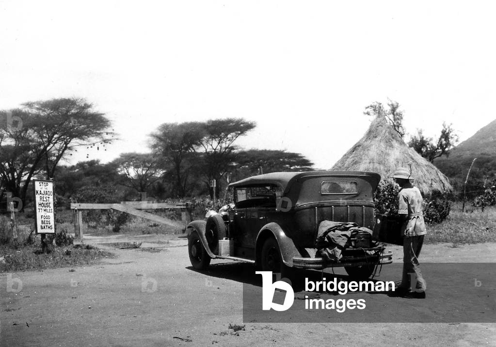 Man near his own car in Longido, border region between Tanzania and Kenya