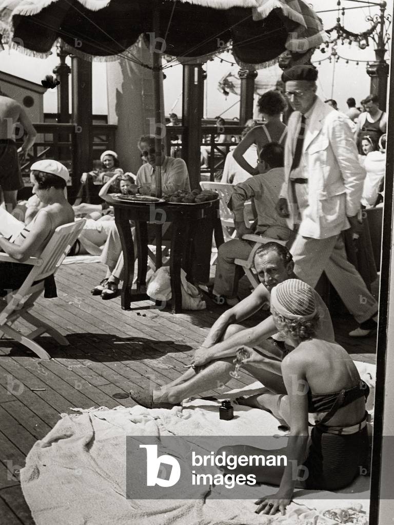 The travelers of the steamboat Roma while sunbathing, 1930-40 (photo)