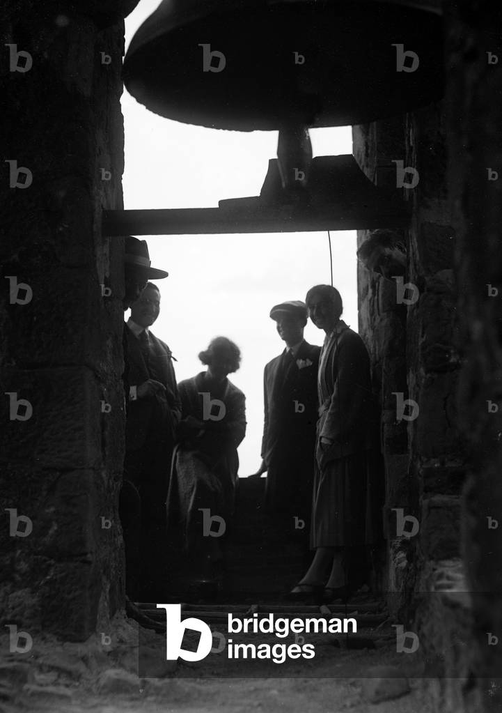 Portrait of a group within a bell