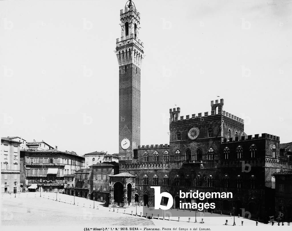 View of Piazza del Campo with Palazzo Pubblico, the Torre del Mangia and the Piazza Chapel. Siena