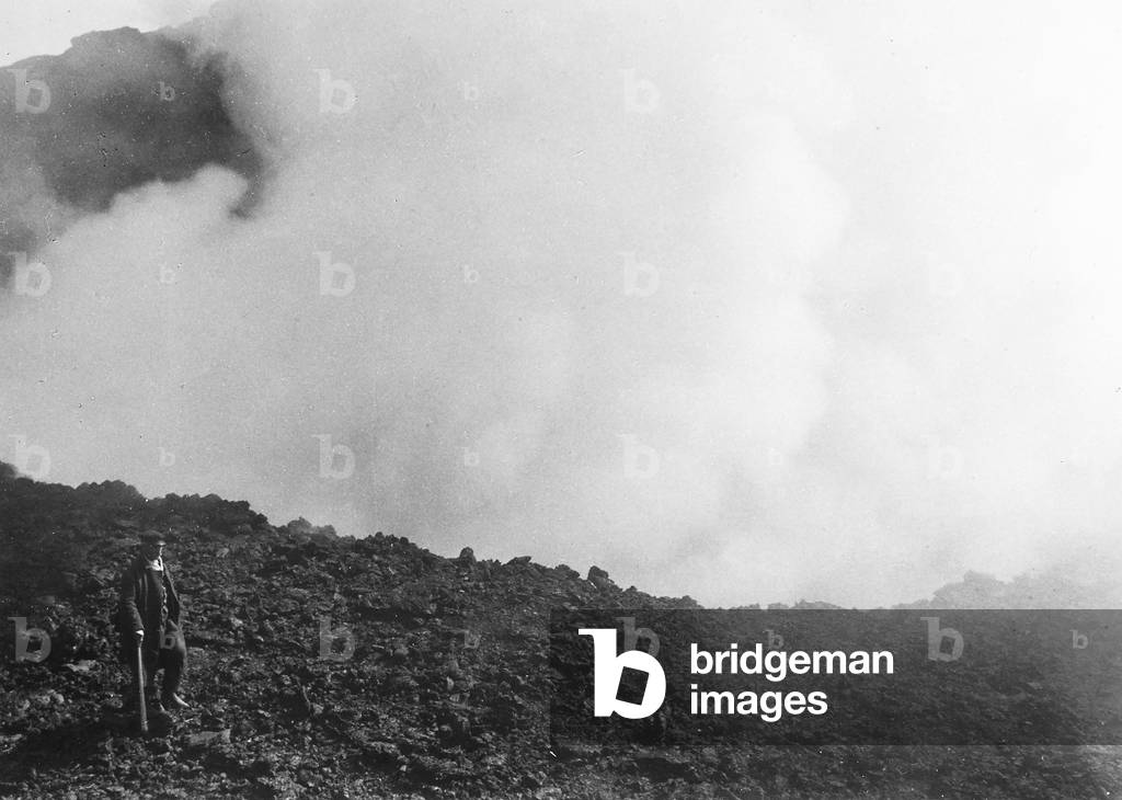 The erupting cone of Vesuvius with a tourist