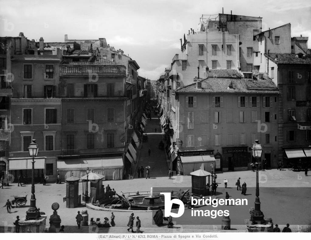 Piazza di Spagna in Rome: the Barcaccia Fountain and via Condotti in the foreground