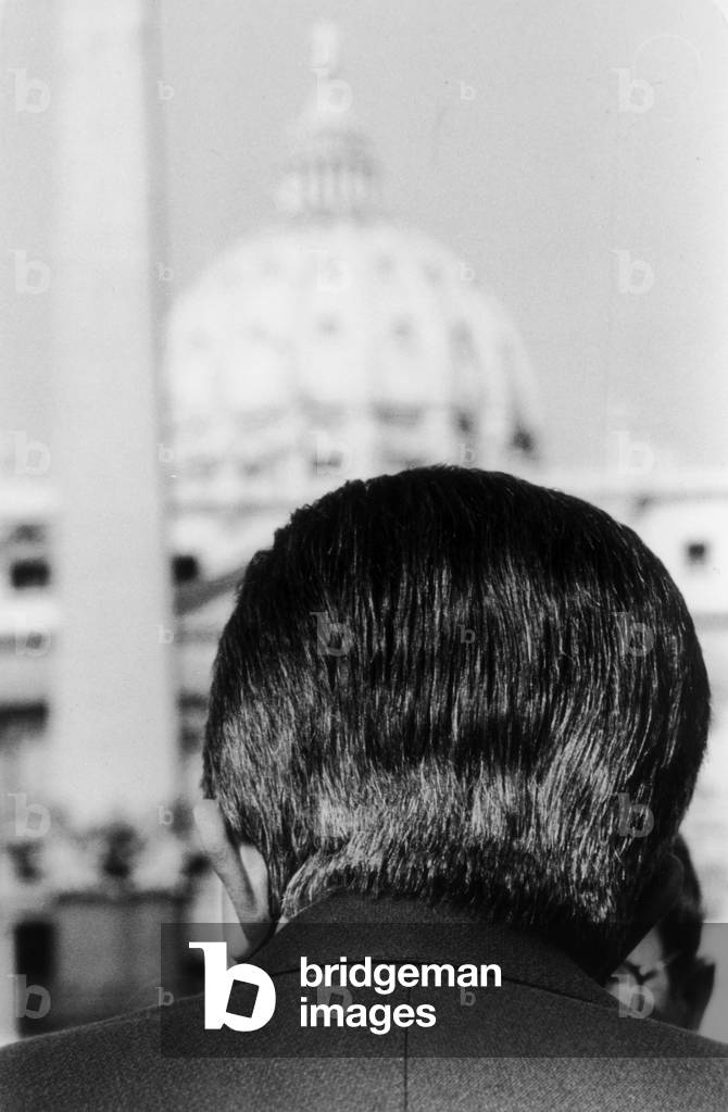 The politician and member of the Christian Democrat Giulio Andreotti. The Basilica of Saint Peter on the background