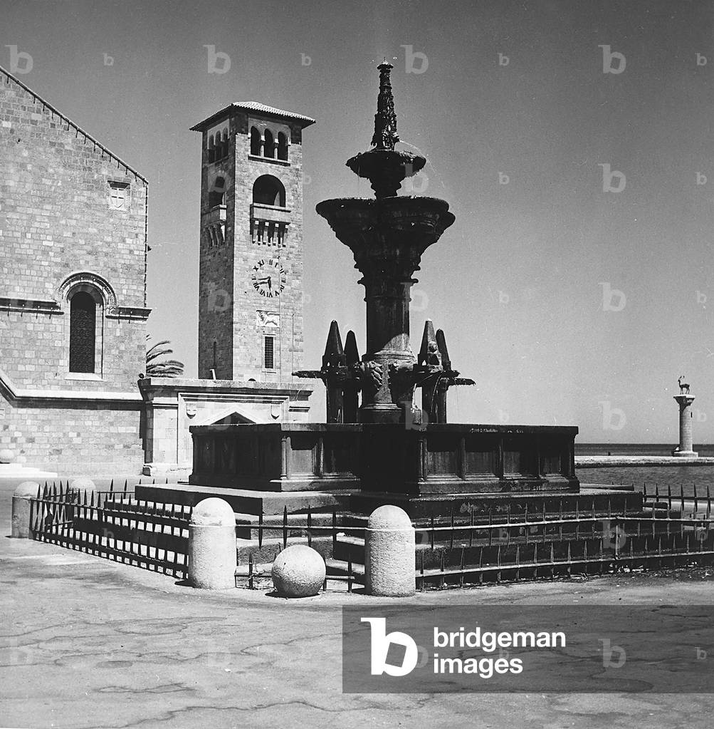 A fountain on a pier in Rhodes, Greece