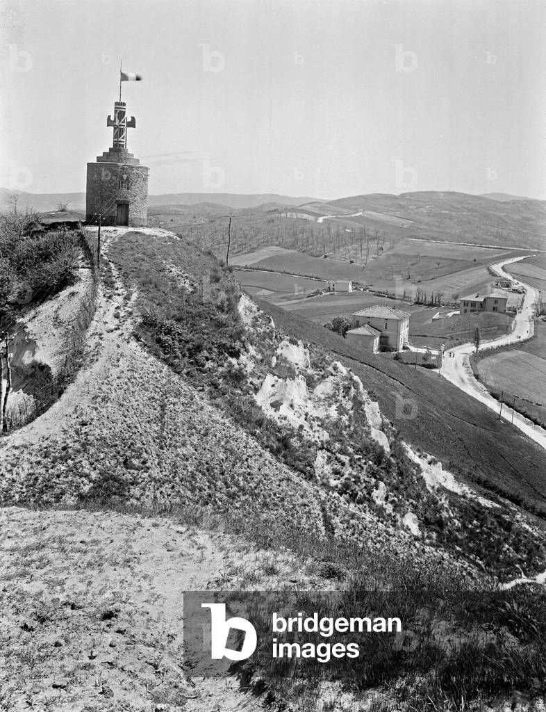 Hill with a small tower and symbol of the fasces