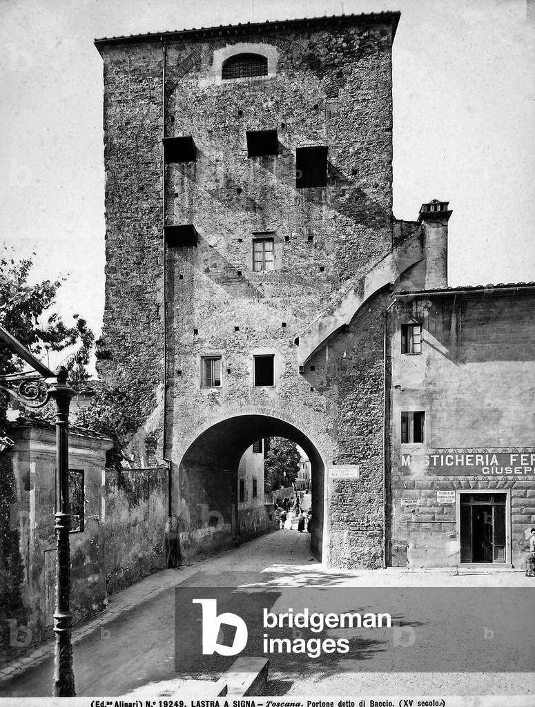 View of the gate called Baccio in Lastra a Signa in the province of Florence, on the right, the sign of a paint and iron shop is visible.