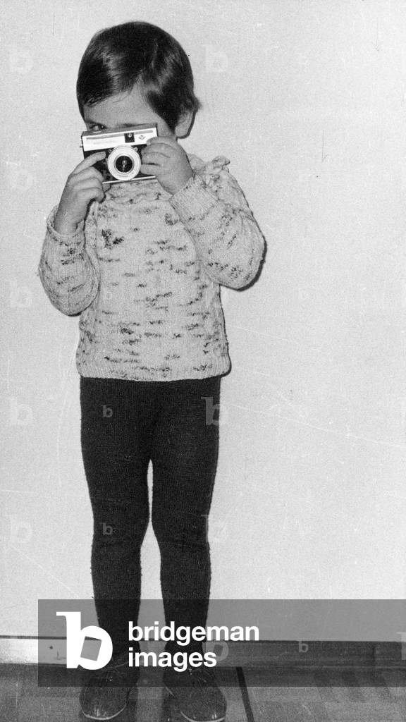 child with camera, 1969