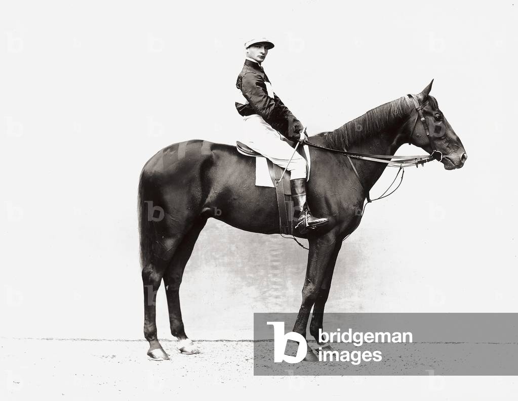 Portrait of a jockey on horseback