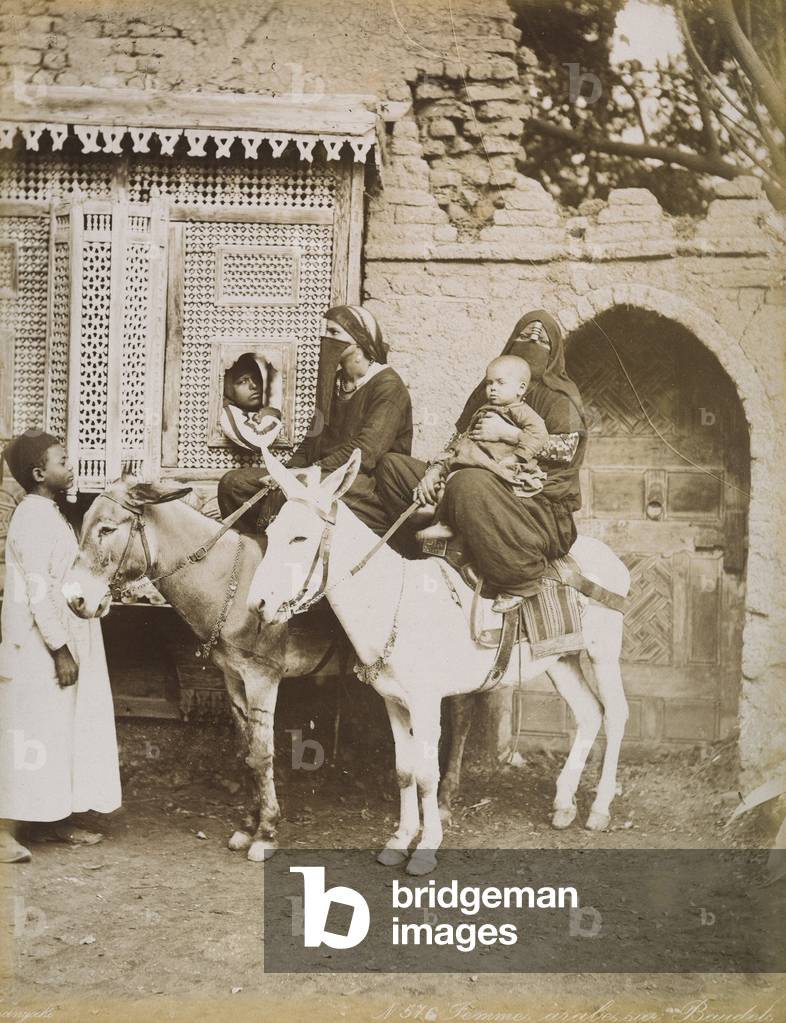 Arab women and a small boy on the back of a donkey, 1885 (print on double-weight paper)