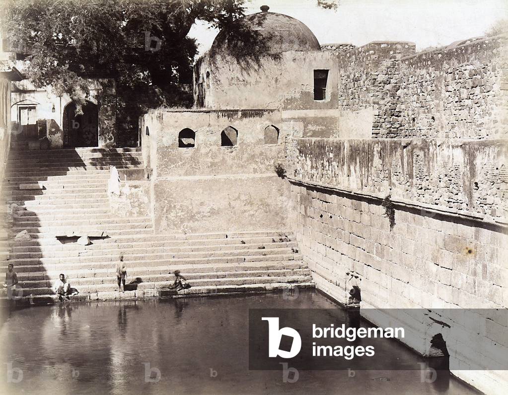 Old buildings on a lake shores in Dehli, India.