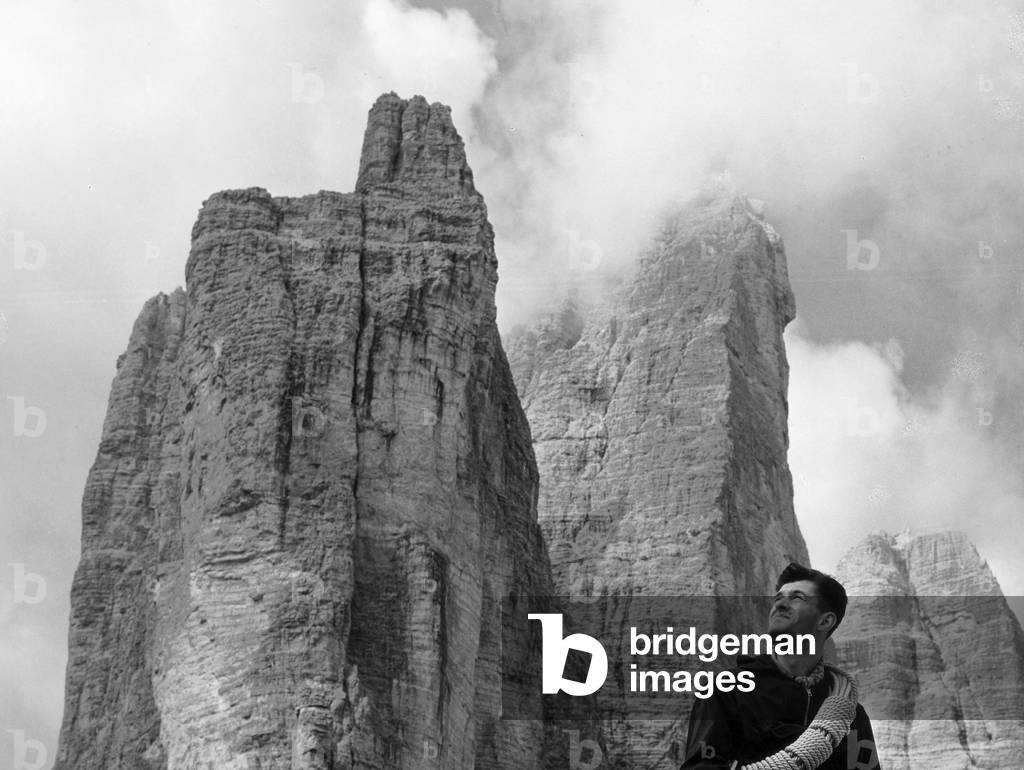 Mountain climber in front of the Three Peaks of Lavaredo