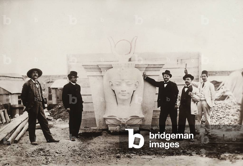 Italians working abroad, 'G. Garozzo and Sons Contracting Co.' in Cairo, Egypt: archeologists and engineers by an archeological find on its way to the Egyptian Museum