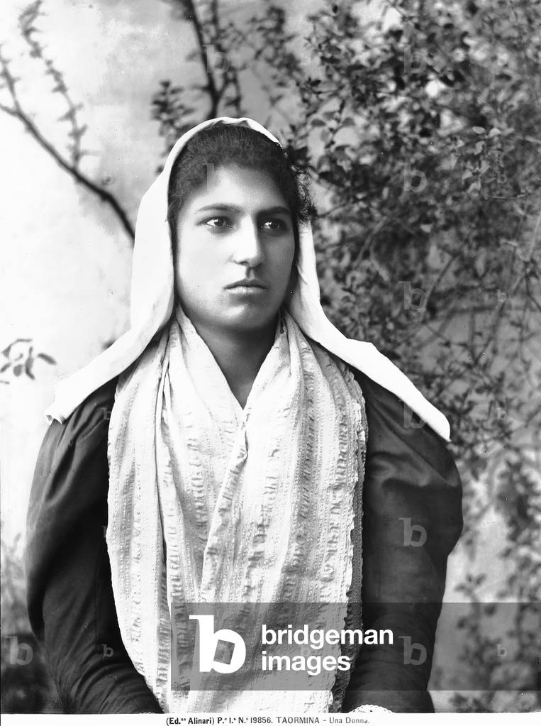 Portrait of a young woman in traditional Sicilian dress; Taormina, Messina