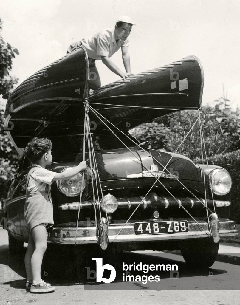 sports, rowing, canoe ready to be transported to the place of use, 1950