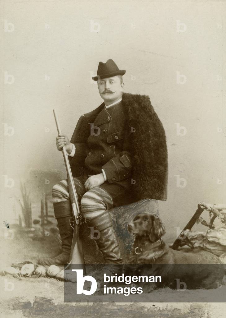 Count Arrigoni degli Oddi dresed for the hunt with dog and rifle, Padua