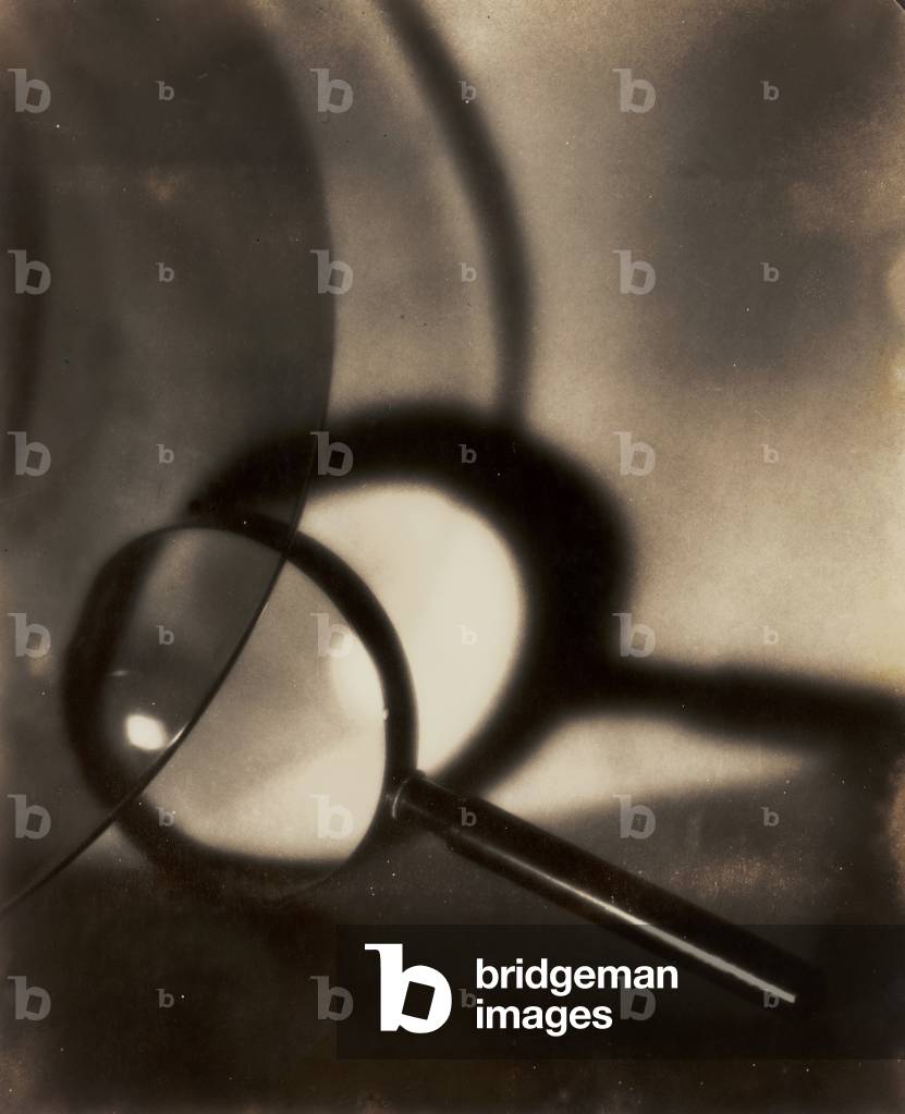 Enlargement glass photographed on a reflecting surface, 1935 (photo)