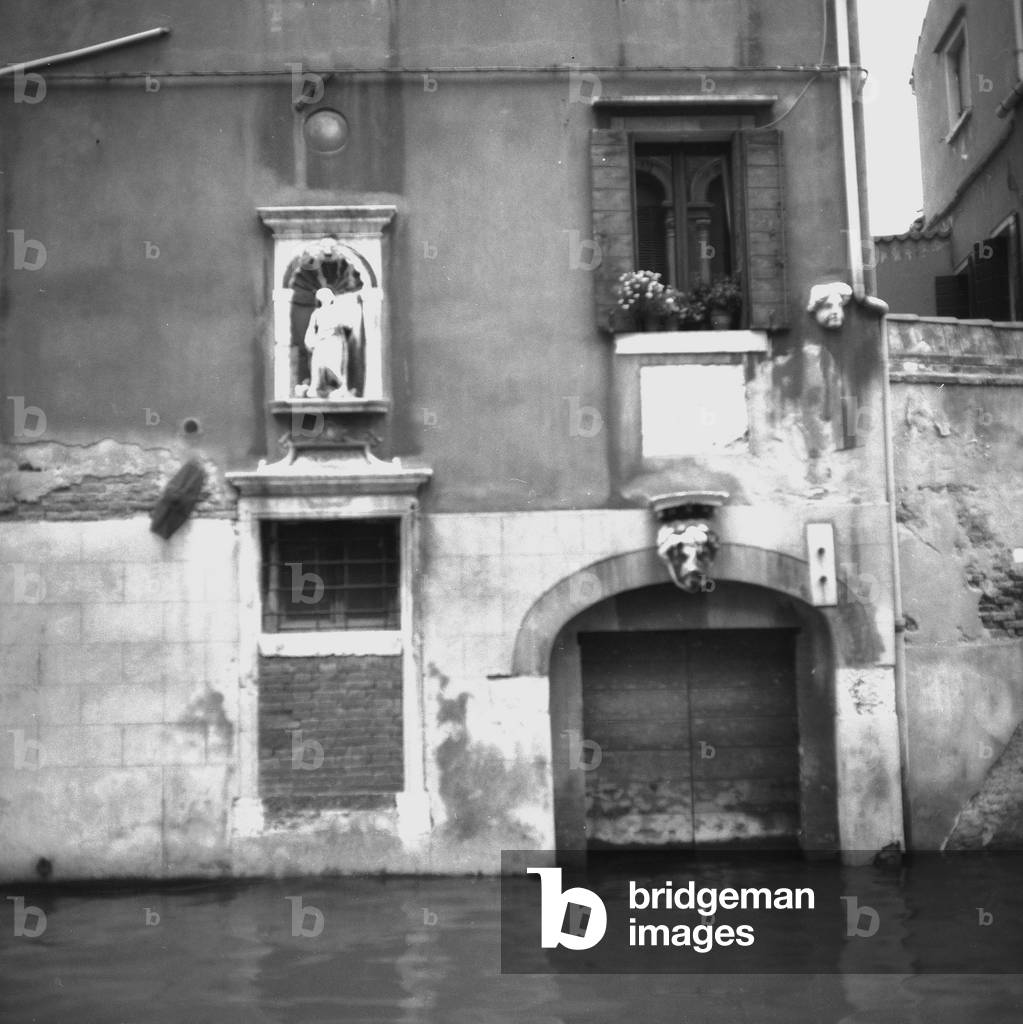 Building on a Venetian canal (b/w photo)