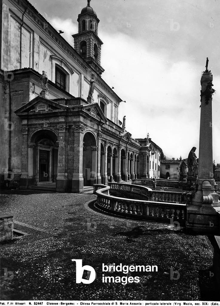 View of the lateral portico of the parrochial Church of Santa Maria Assunta, Clusone, province of Bergamo.