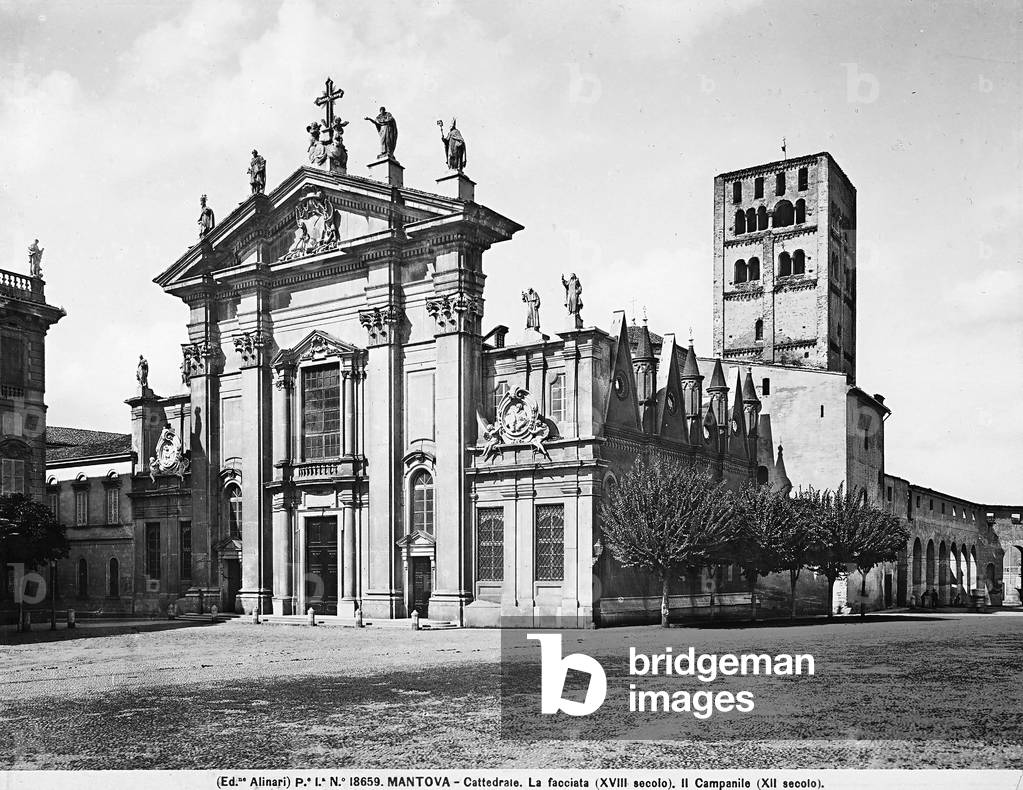 Facade and bell tower of the Cathedral of St. Peter in Mantua. The former was carried out from a design of Nicola Baschiera, while the latter dates to the Romanesque period.