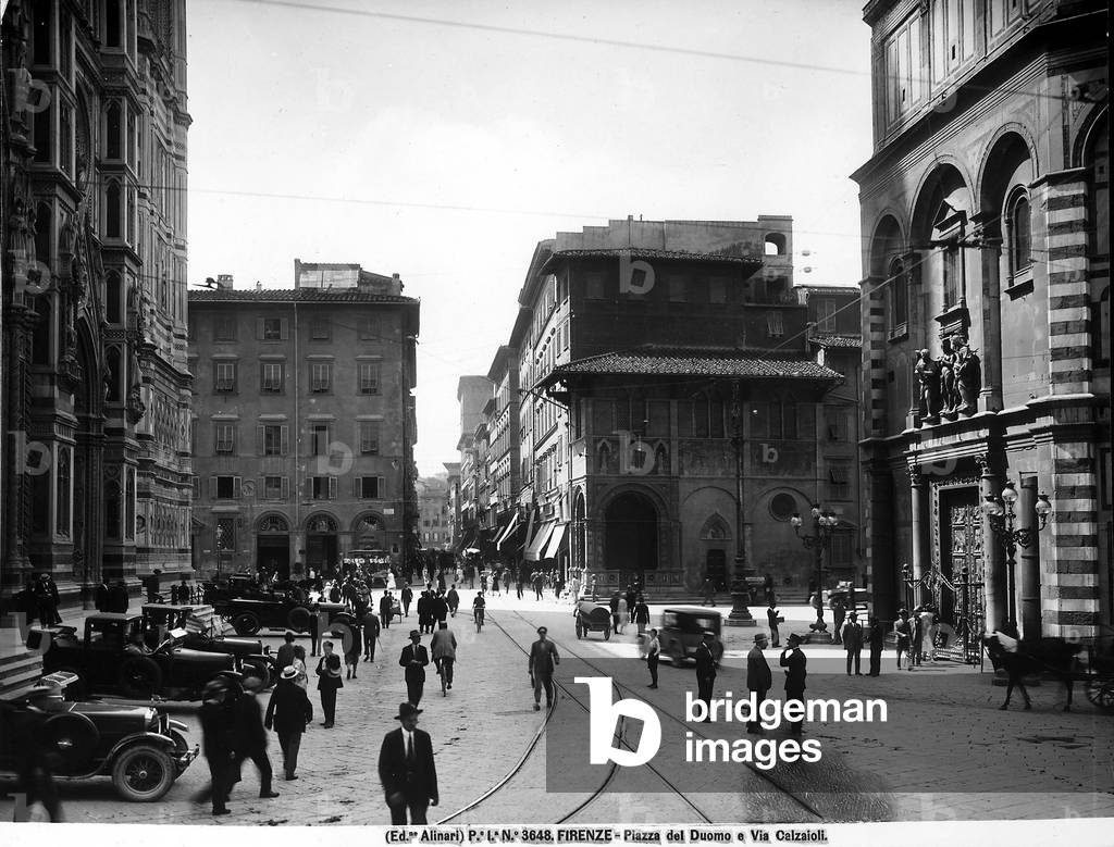 Piazza del Duomo in Florence animated by passers-by and automobiles
