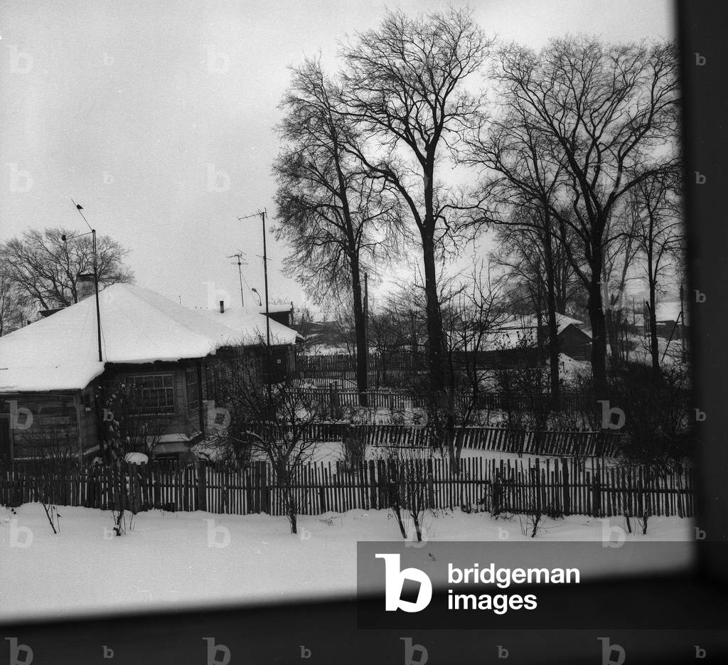 Homes of Suzdal with snow (b/w photo)