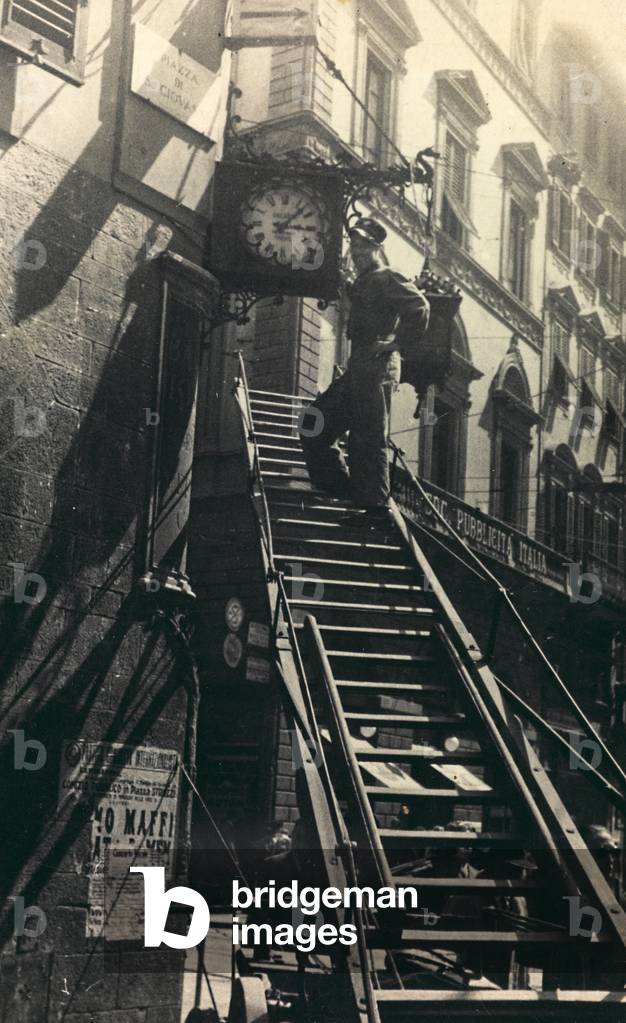 Clock Repair on the corner of Via Martelli, Florence