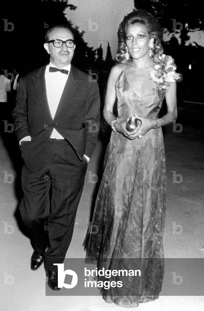 The famous Italian film director Alberto Lattuada and Silvia Monti at a reception
