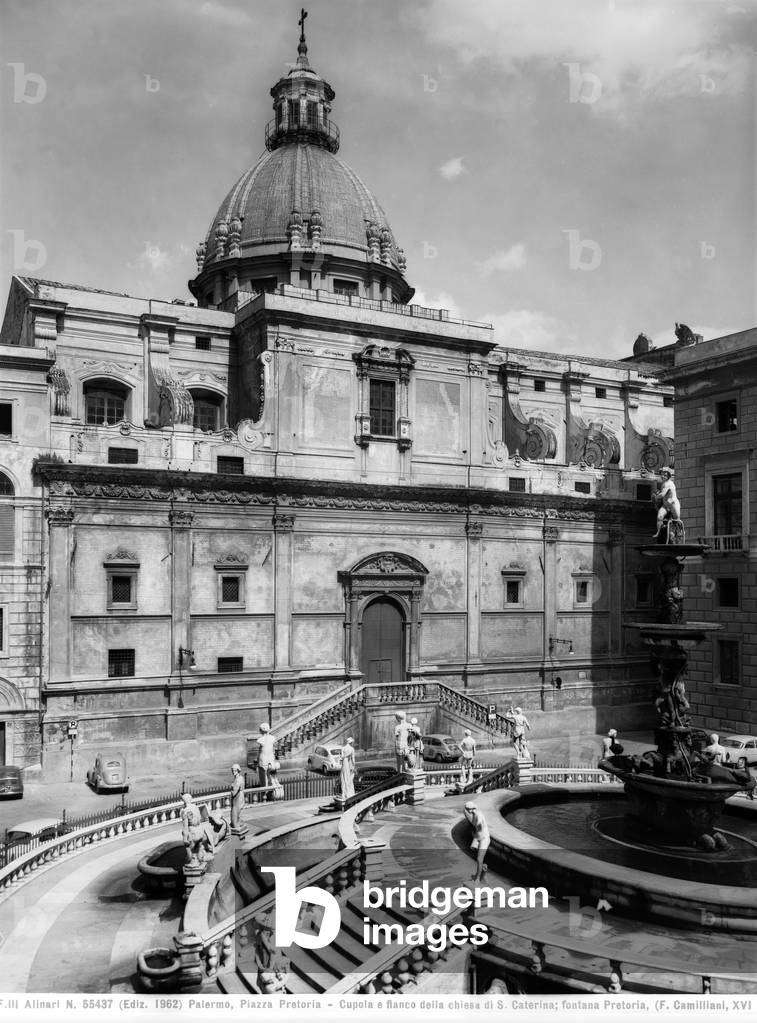 The central fountain in Piazza Pretoria, and the dome and side of the church of Santa Caterina in Palermo