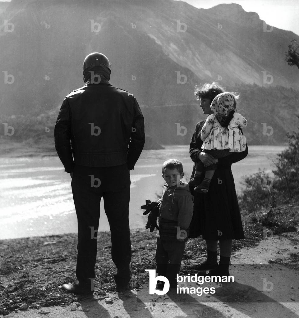 Local Family Surveying the Aftermath of the Vajont Landslide, Belluno, 1963 (gelatin silver print)