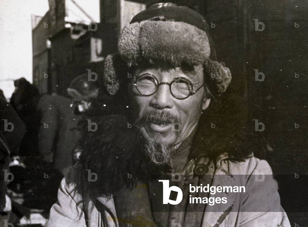Half-length portrait of an elderly Russian of Mongolian ethnic group taken by an Italian soldier in the offensive campaign of 1942-43, 1943 (print on double-weight paper)
