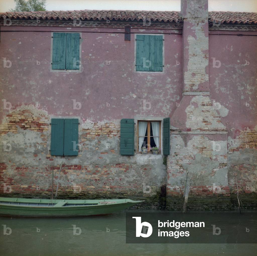 Boat in a canal in Torcello (photo)