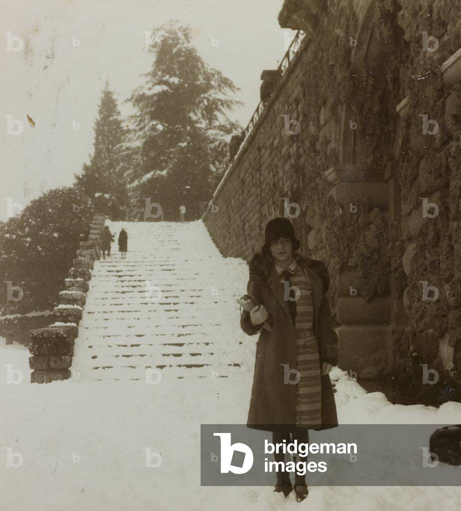 Portrait of a young woman in front of the stairs of San Niccolò, Florence